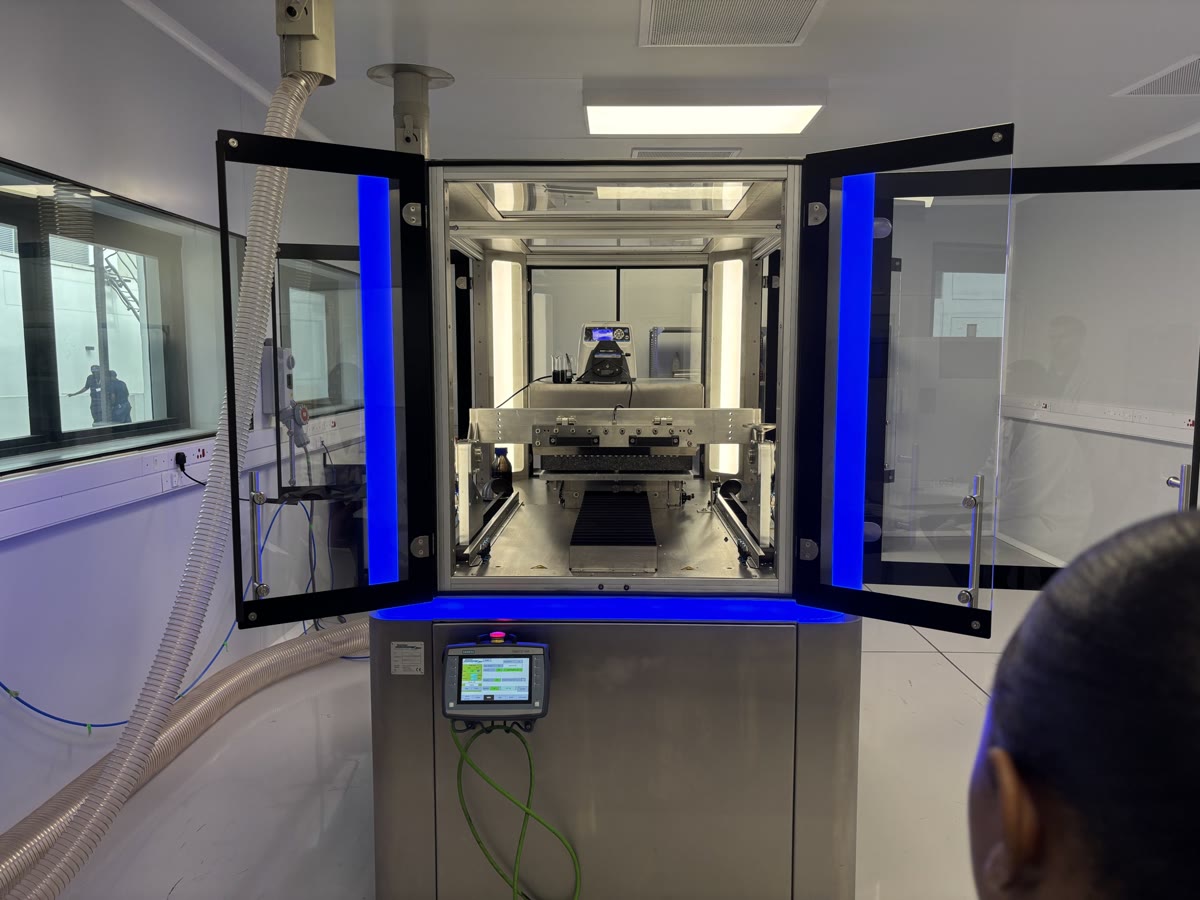 An Isondo technician operating the precision membrane coating line at the OR Tambo SEZ facility.
