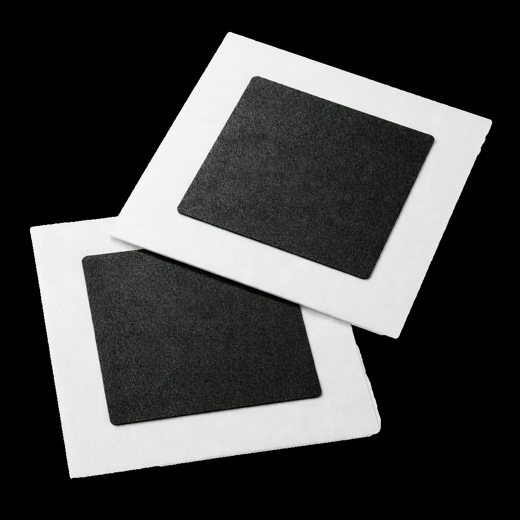 Two finished catalyst-coated membranes with sub-gasket frames.